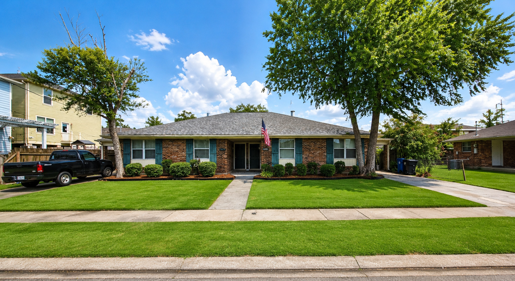 Residential lawn maintained by Sharper Lawn & Hammer
